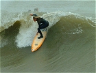 Surfing at Bob Hall Pier (12-13-03)